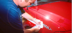 Adding a bit of flair to a Ford F-150 with vinyl graphics from Permanent Impressions.